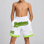 Custom White Authentic Throwback Basketball Shorts with Neon Green and Black Lettering youth size worn by child model