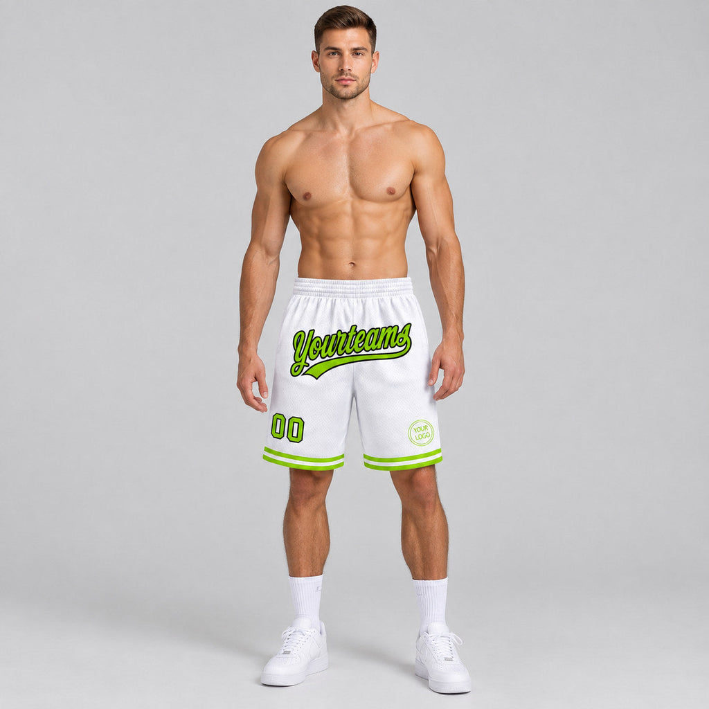 Custom White Authentic Throwback Basketball Shorts with Neon Green and Black Lettering worn by male model