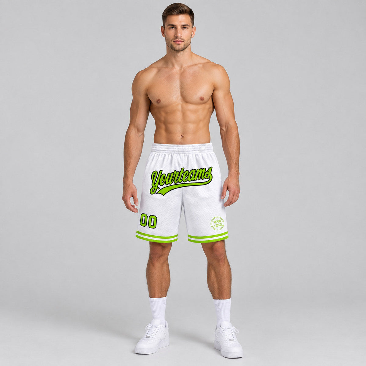 Custom White Authentic Throwback Basketball Shorts with Neon Green and Black Lettering worn by male model