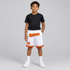 Custom White Authentic Throwback Basketball Shorts with Red and Gold Lettering Design 1298 youth size worn by child model
