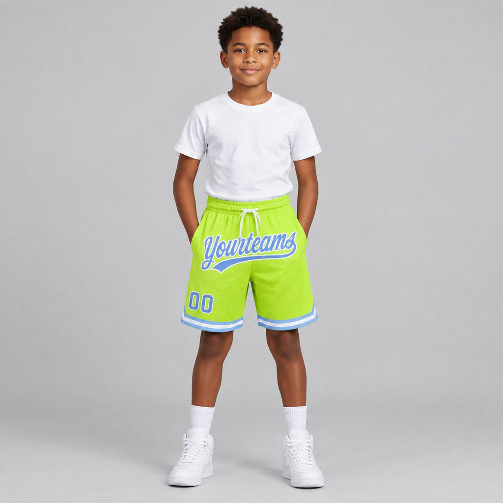 Custom Neon Green Authentic Throwback Basketball Shorts with Light Blue and White Lettering youth size worn by child model