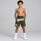 Custom Olive and White Salute To Service Basketball Shorts with Old Gold and Black Lettering youth size worn by child model