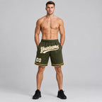 Custom Olive and White Salute To Service Basketball Shorts with Old Gold and Black Lettering worn by male model
