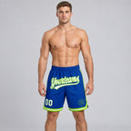 Custom Royal Authentic Throwback Basketball Shorts with White and Neon Green Lettering worn by male model