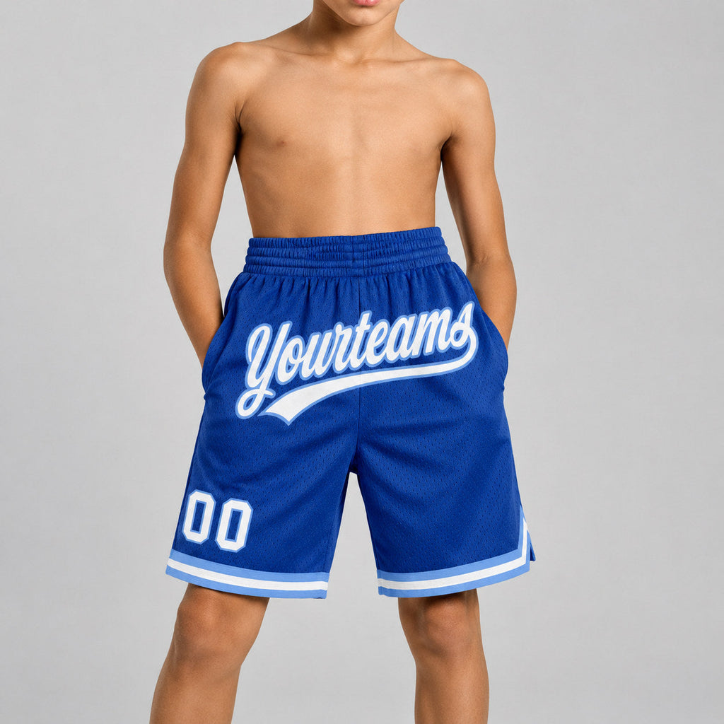 Custom Royal Authentic Throwback Basketball Shorts with White and Light Blue Lettering Design 0497 youth size worn by child model