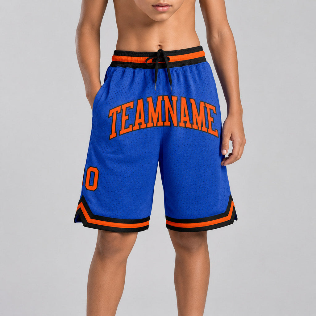 Custom Blue Authentic Throwback Basketball Shorts with Orange and Black Lettering youth size worn by child model