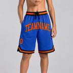 Custom Blue Authentic Throwback Basketball Shorts with Orange and Black Lettering youth size worn by child model