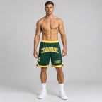 Custom Hunter Green Authentic Throwback Basketball Shorts with Gold and White Lettering worn by male model