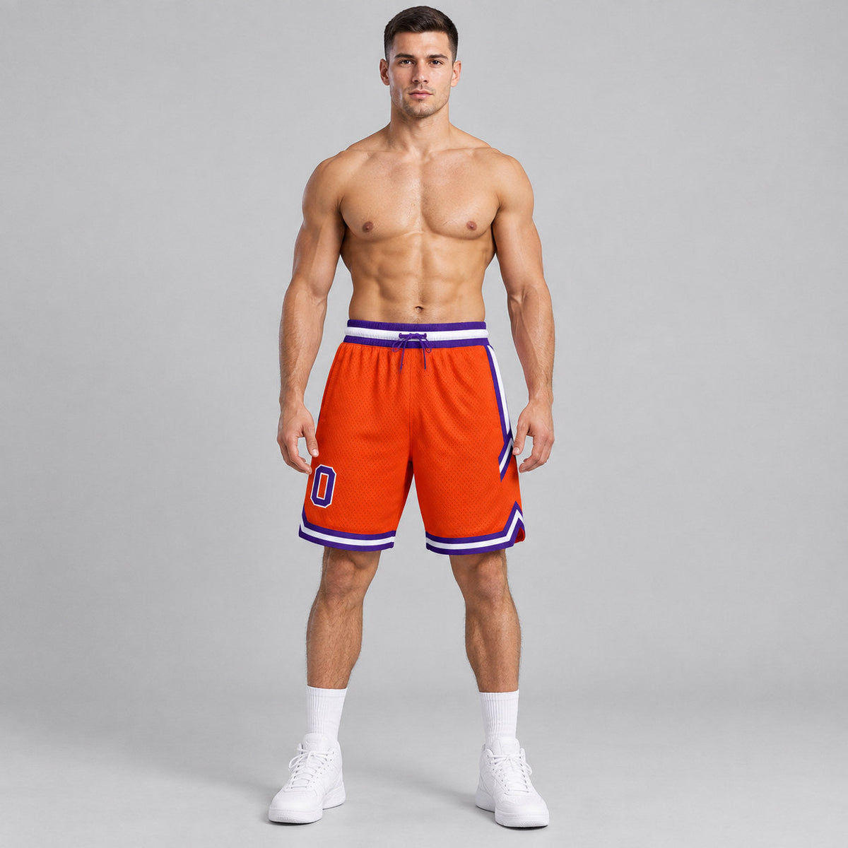 Custom Orange Authentic Throwback Basketball Shorts with Purple and White Lettering worn by male model