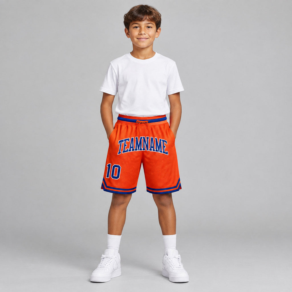 Custom Orange Authentic Throwback Basketball Shorts with Royal and White Lettering Design 0277 youth size worn by child model