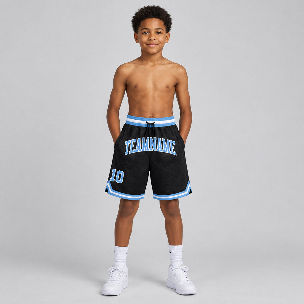 Custom Black Authentic Throwback Basketball Shorts with Light Blue and White Lettering Design 1267 youth size worn by child model