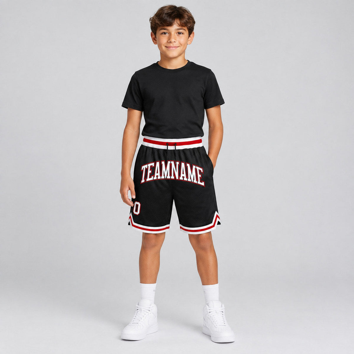 Custom Black Authentic Throwback Basketball Shorts with White and Red Lettering Design 1268 youth size worn by child model