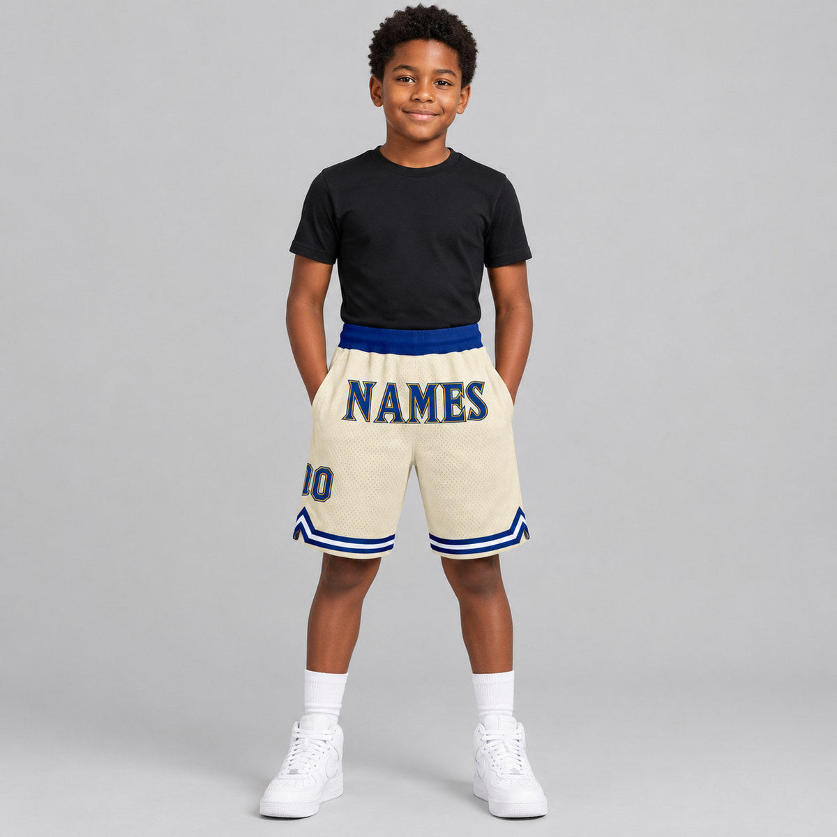 Custom Cream Authentic Throwback Basketball Shorts with Royal and Gold Lettering youth size worn by child model