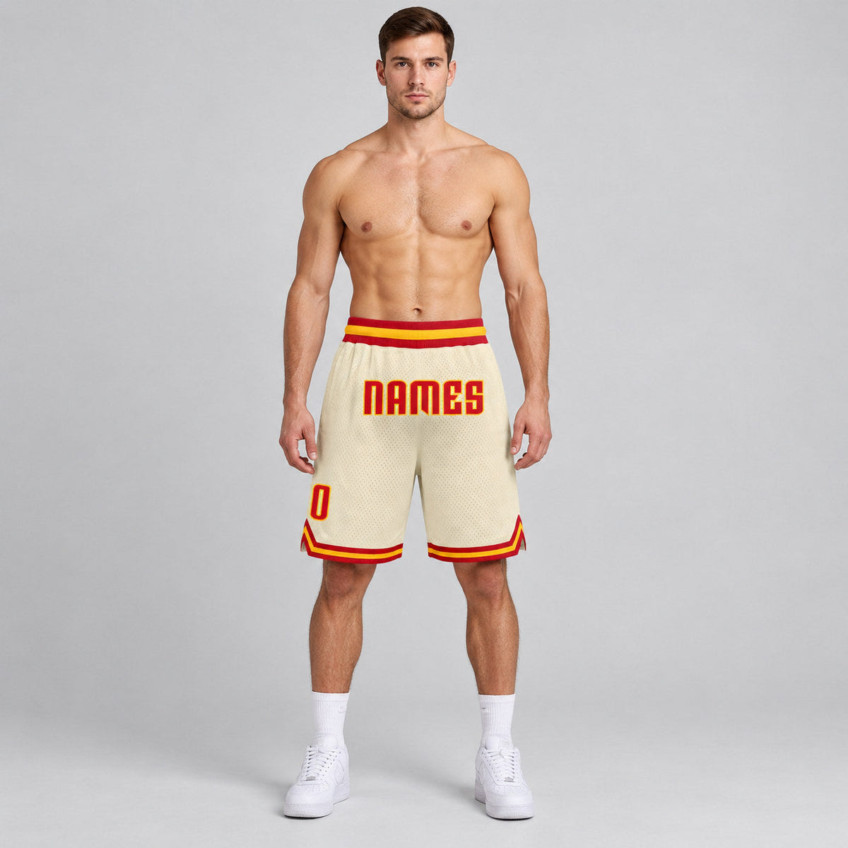 Custom Cream Authentic Throwback Basketball Shorts with Red and Gold Lettering Design 0083 worn by male model