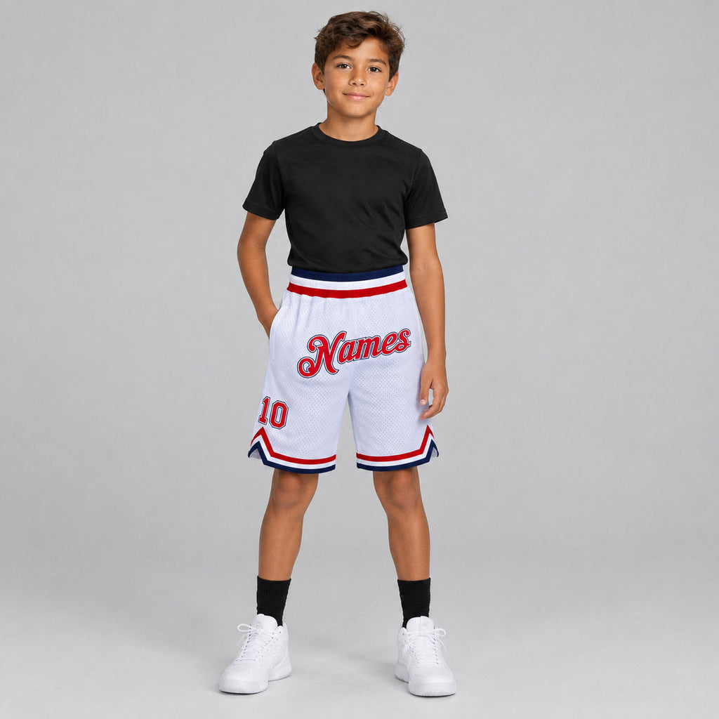 Custom White Authentic Throwback Basketball Shorts with Red and Navy Lettering youth size worn by child model