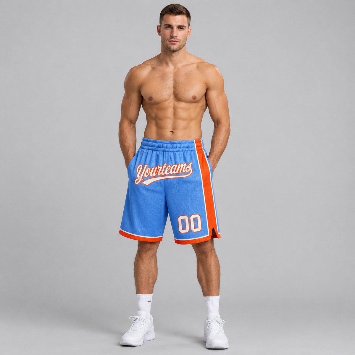 Custom Light Blue Authentic Basketball Shorts with White and Orange Lettering worn by male model