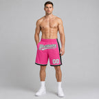 Custom Pink Authentic Basketball Shorts with White and Black Lettering worn by male model