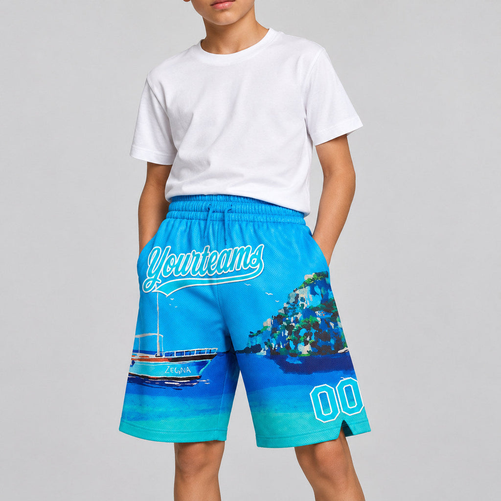 Custom Light Blue Hawaii Beach Island Basketball Shorts with Lakes Blue and White Lettering youth size worn by child model