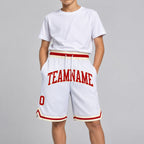 Custom White Authentic Throwback Basketball Shorts with Red and Cream Lettering youth size worn by child model