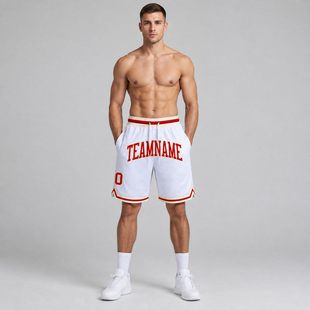 Custom White Authentic Throwback Basketball Shorts with Red and Cream Lettering worn by male model