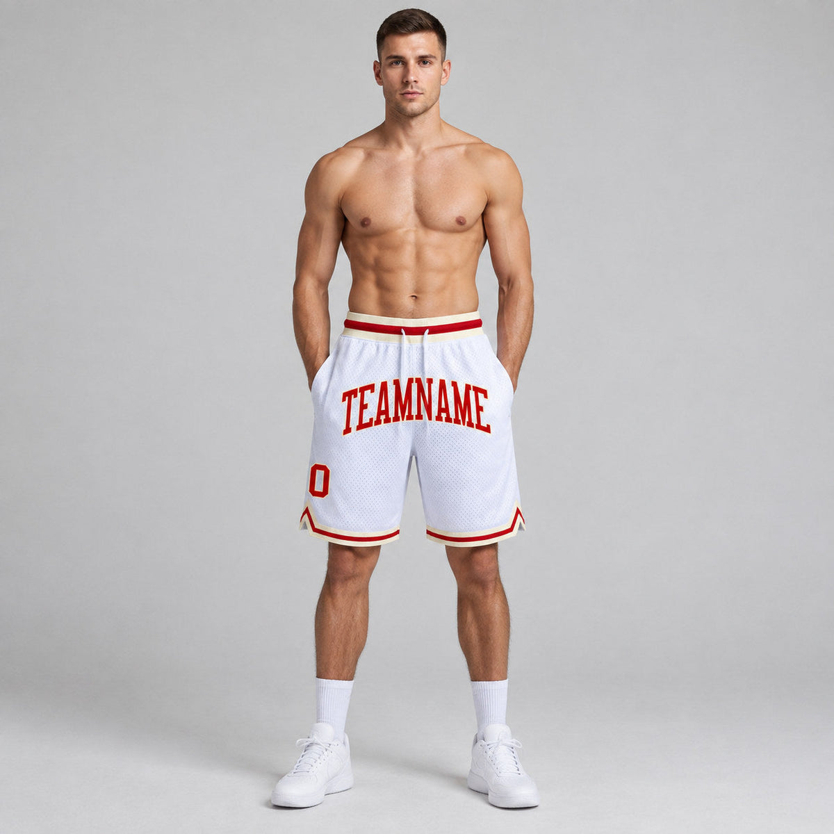 Custom White Authentic Throwback Basketball Shorts with Red and Cream Lettering worn by male model
