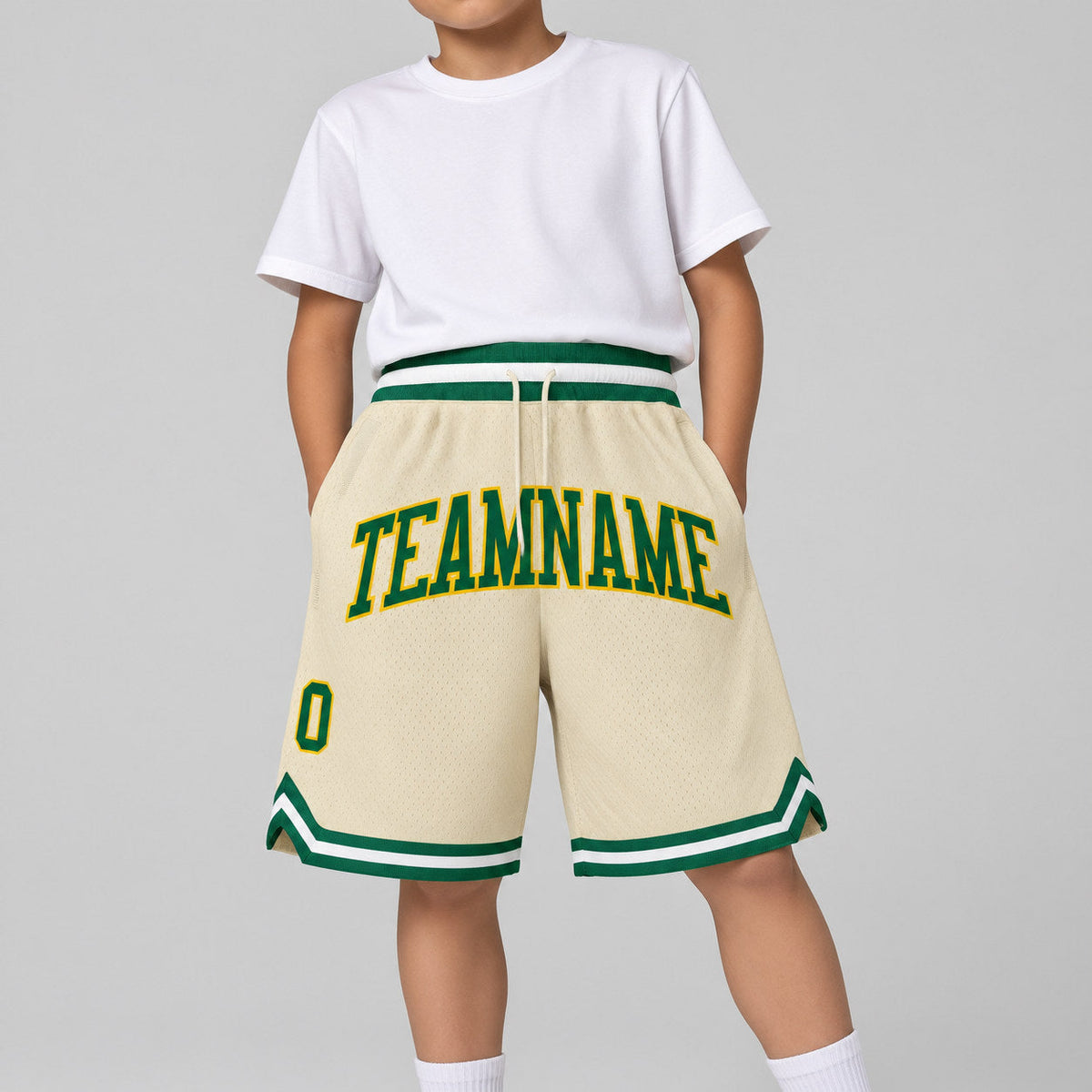 Custom Cream Authentic Throwback Basketball Shorts with Kelly Green and Gold Lettering youth size worn by child model