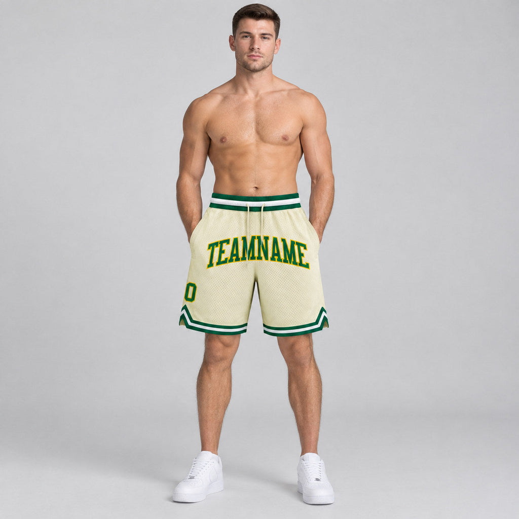 Custom Cream Authentic Throwback Basketball Shorts with Kelly Green and Gold Lettering worn by male model