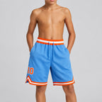 Custom Light Blue Authentic Throwback Basketball Shorts with Orange and White Lettering youth size worn by child model