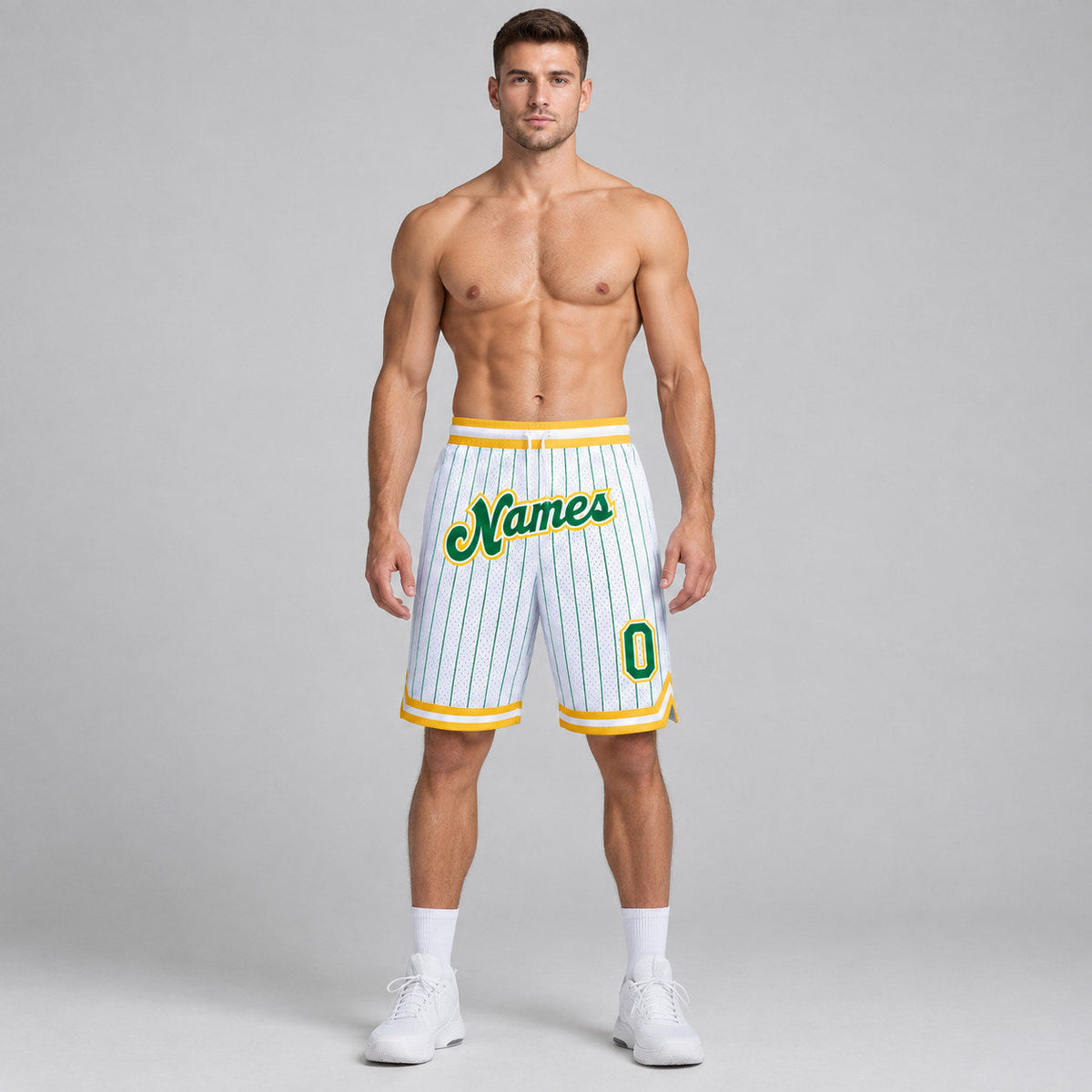 Custom White and Kelly Green Basketball Shorts with Kelly Green and Gold Lettering worn by male model