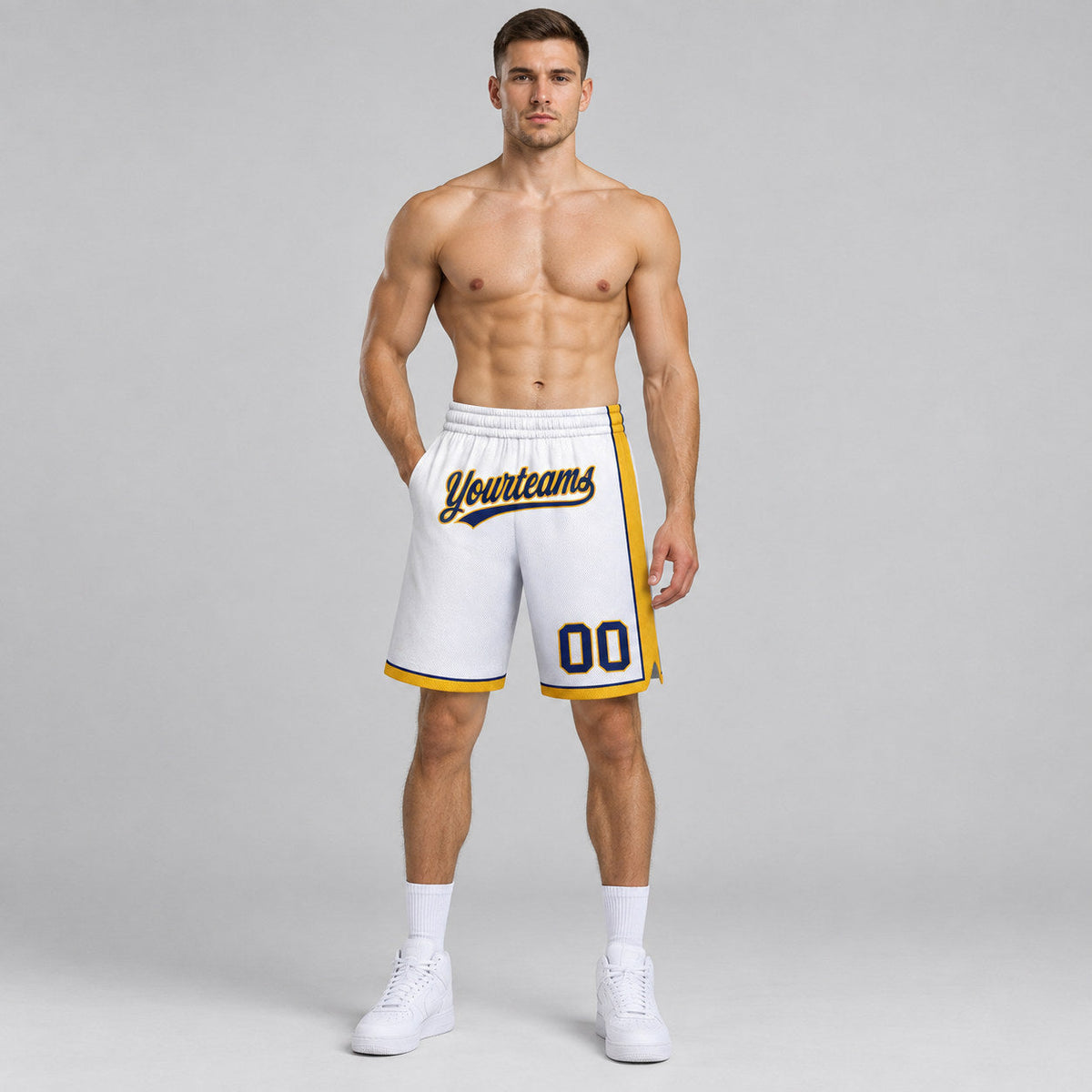 Custom White Authentic Basketball Shorts with Navy and Gold Lettering worn by male model