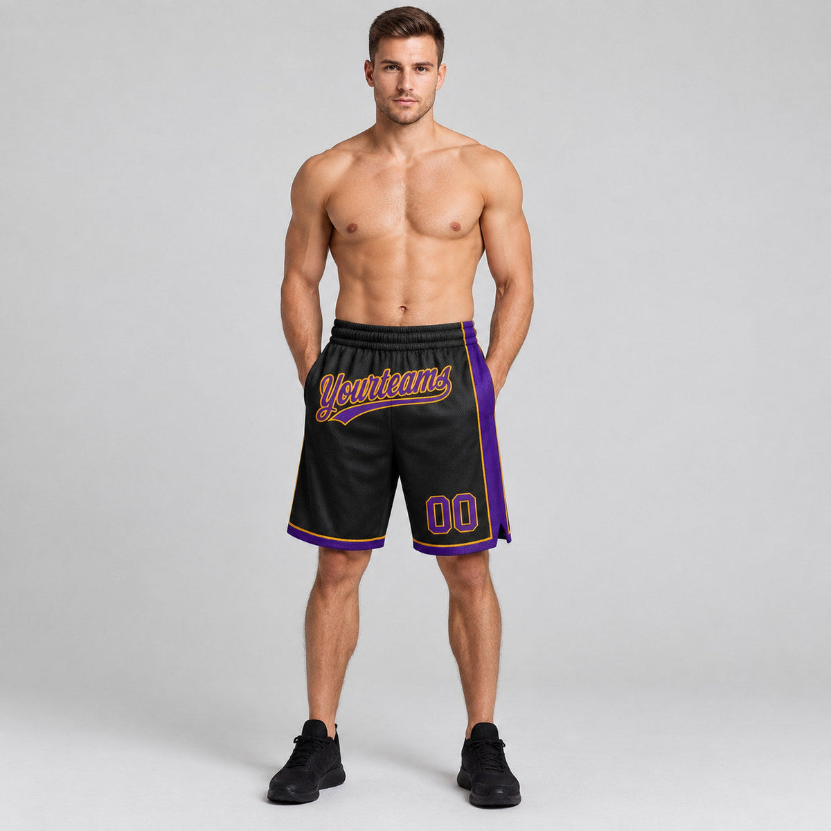 Custom Black Authentic Basketball Shorts with Purple and Gold Lettering worn by male model