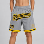 Custom Gray Authentic Throwback Basketball Shorts with Black and Gold Lettering youth size worn by child model