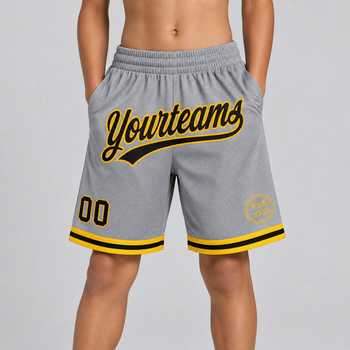 Custom Gray Authentic Throwback Basketball Shorts with Black and Gold Lettering youth size worn by child model