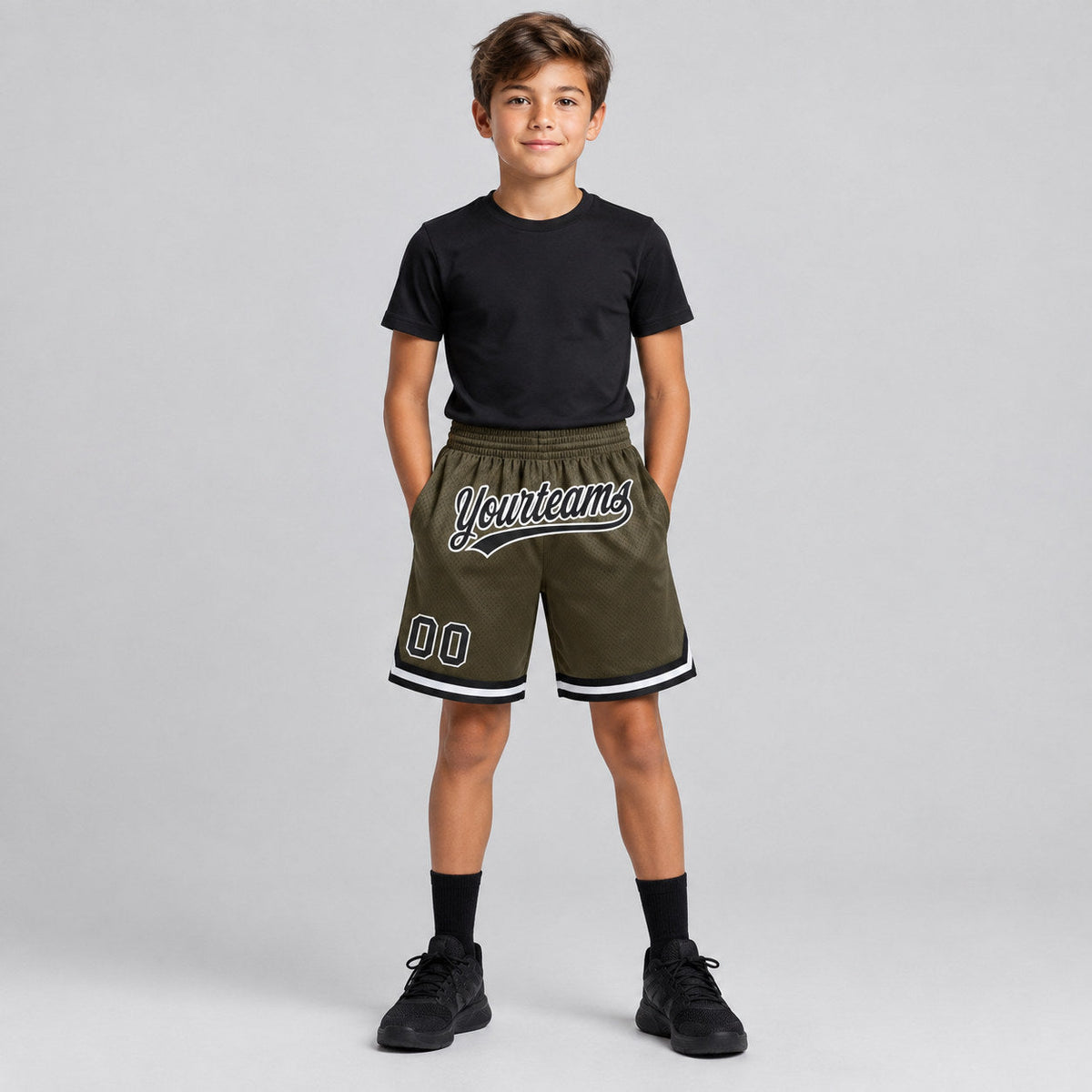Custom Olive Salute To Service Authentic Throwback Basketball Shorts with Black and White Lettering youth size worn by child model