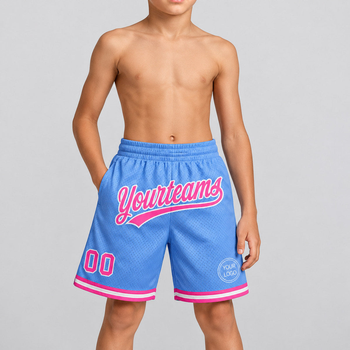 Custom Light Blue Authentic Throwback Basketball Shorts with Pink and White Lettering youth size worn by child model