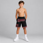 Custom Black Authentic Throwback Basketball Shorts with Maroon and Cream Lettering Design 1402 youth size worn by child model