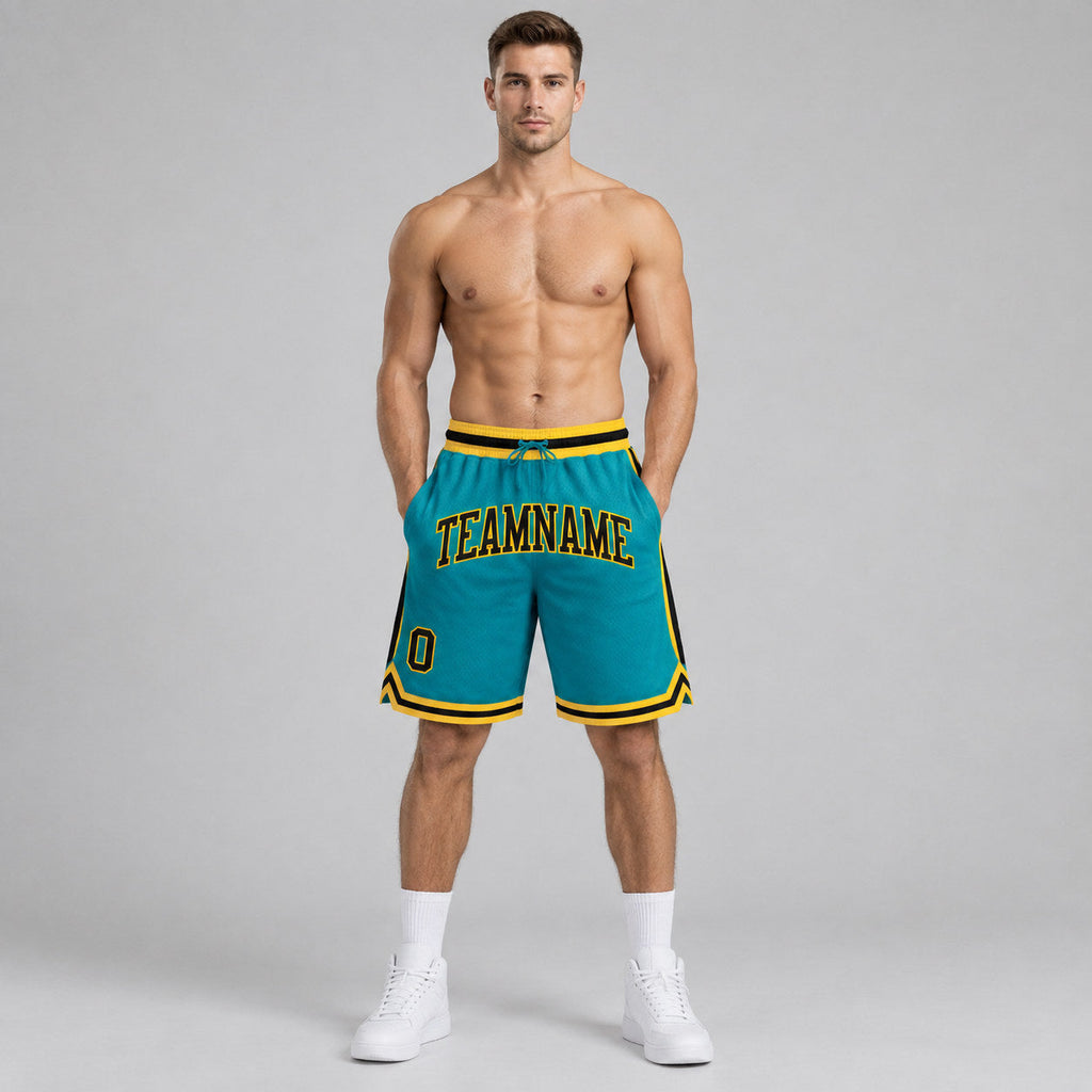Custom Teal Authentic Throwback Basketball Shorts with Black and Gold Lettering worn by male model