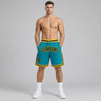 Custom Teal Authentic Throwback Basketball Shorts with Black and Gold Lettering worn by male model
