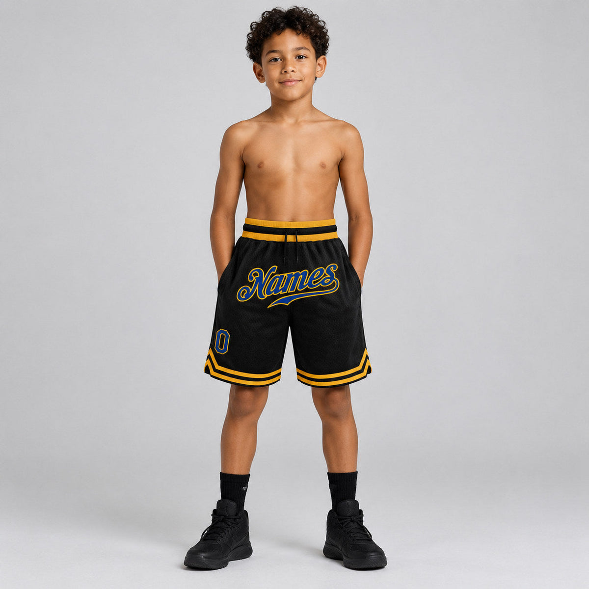 Custom Black Authentic Throwback Basketball Shorts with Royal and Gold Lettering youth size worn by child model