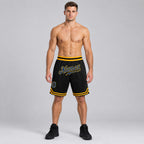 Custom Black Authentic Throwback Basketball Shorts with Royal and Gold Lettering worn by male model