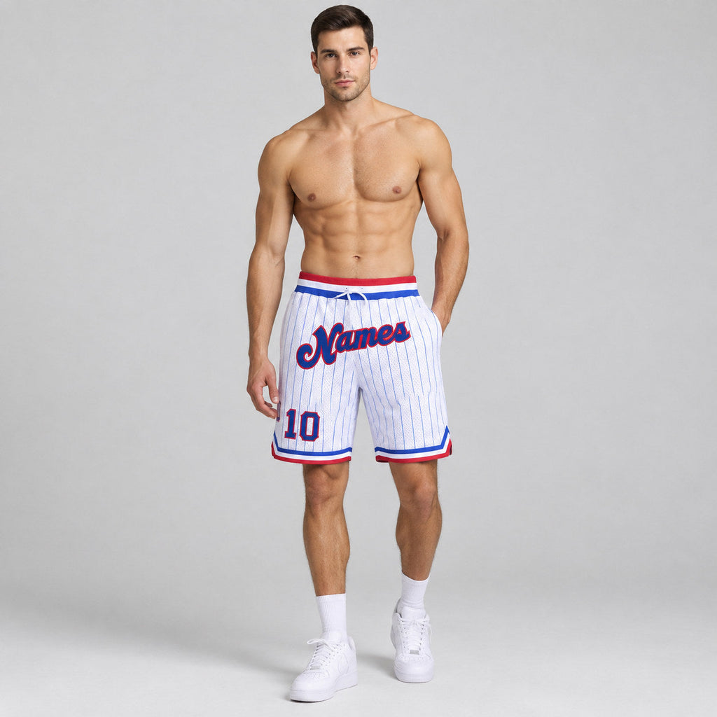 Custom White and Royal Pinstripe Authentic Basketball Shorts with Royal and Red Lettering worn by male model