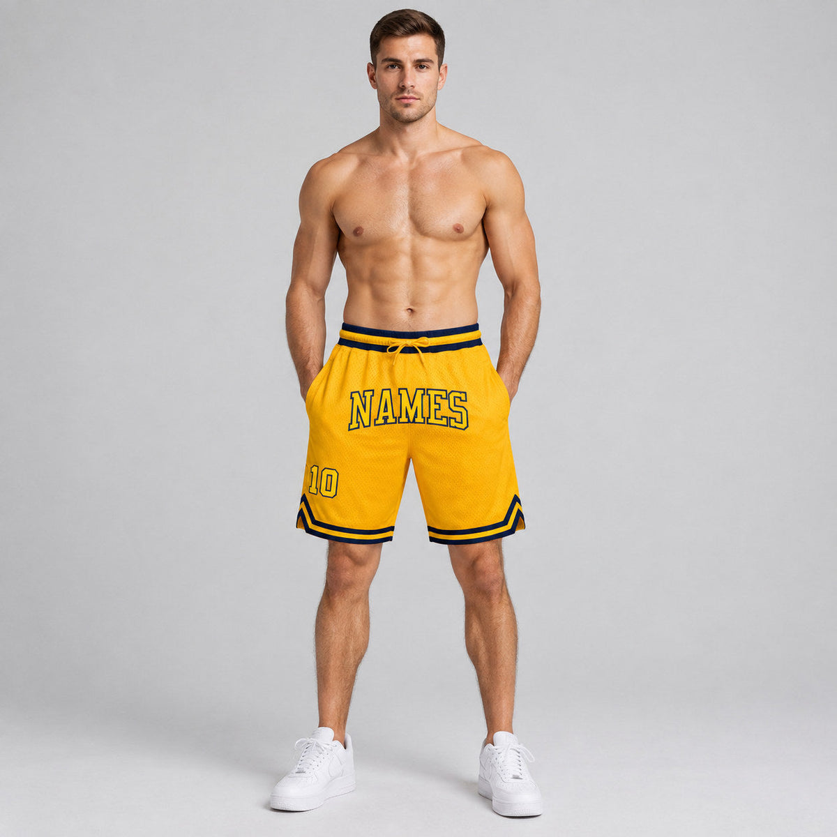 Custom Gold Authentic Throwback Basketball Shorts with Gold and Navy Lettering worn by male model