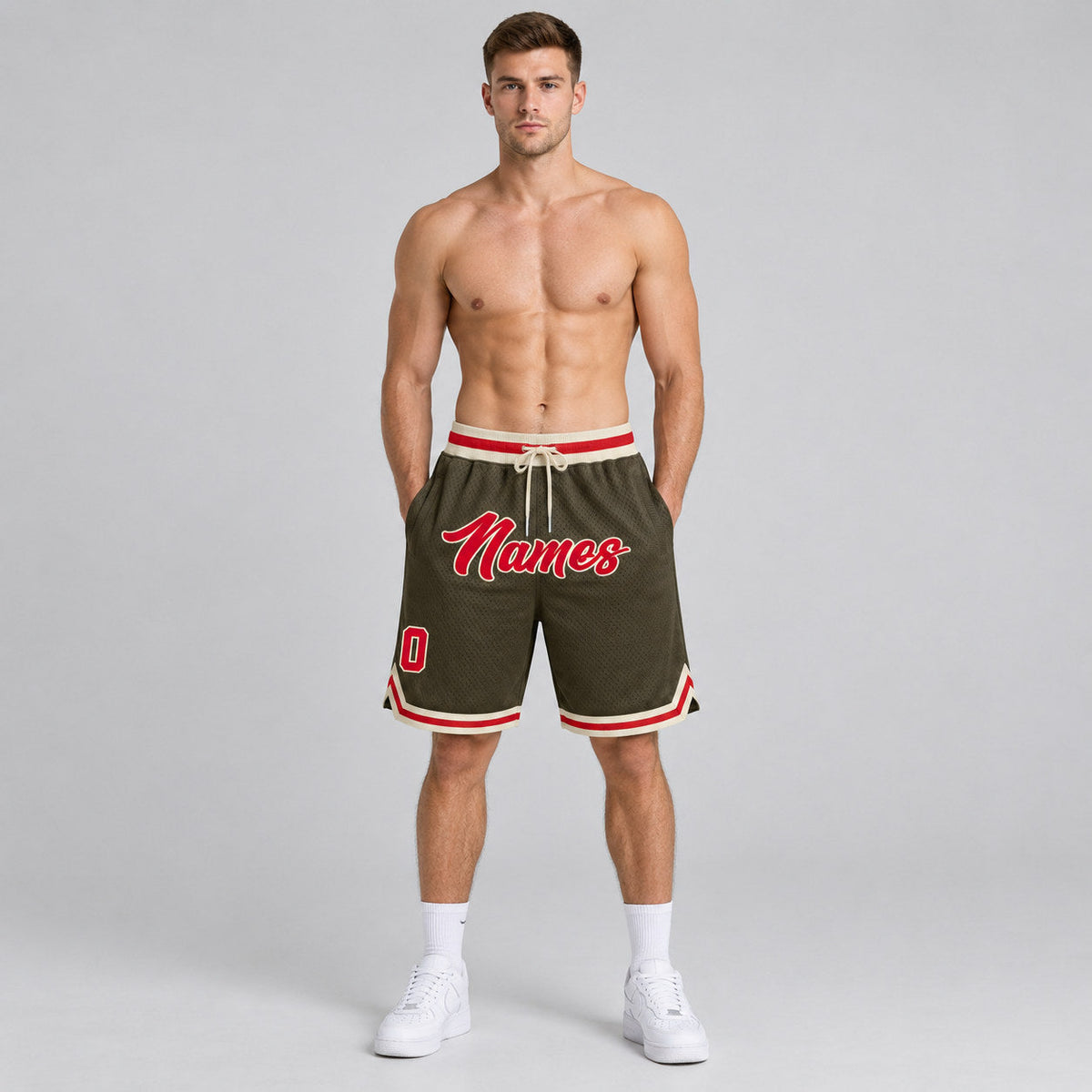 Custom Olive Salute To Service Authentic Throwback Basketball Shorts with Red and Cream Lettering worn by male model