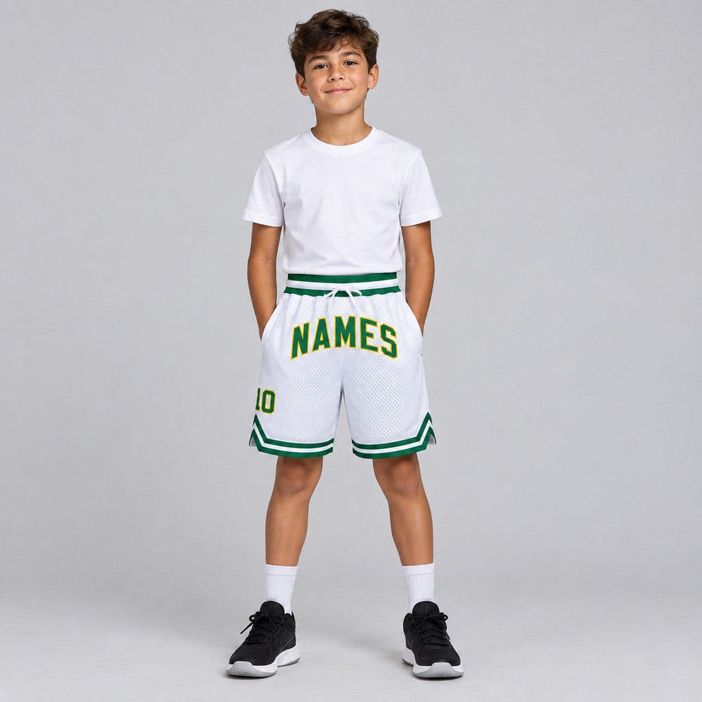 Custom White Authentic Throwback Basketball Shorts with Kelly Green and Gold Lettering youth size worn by child model