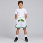Custom White Authentic Throwback Basketball Shorts with Kelly Green and Gold Lettering youth size worn by child model