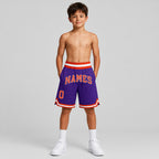 Custom Purple Authentic Throwback Basketball Shorts with Orange and Gray Lettering youth size worn by child model