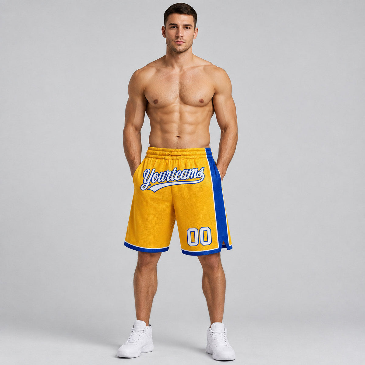 Custom Gold Authentic Basketball Shorts with White and Royal Lettering worn by male model