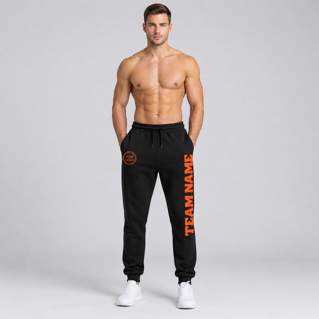 Custom Black Fleece Jogger Sweatpants with Orange Accents worn by male model