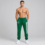 Custom Kelly Green Fleece Jogger Sweatpants with White Accents worn by male model