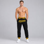 Custom Black Pants with Black and Gold Accents worn by male model